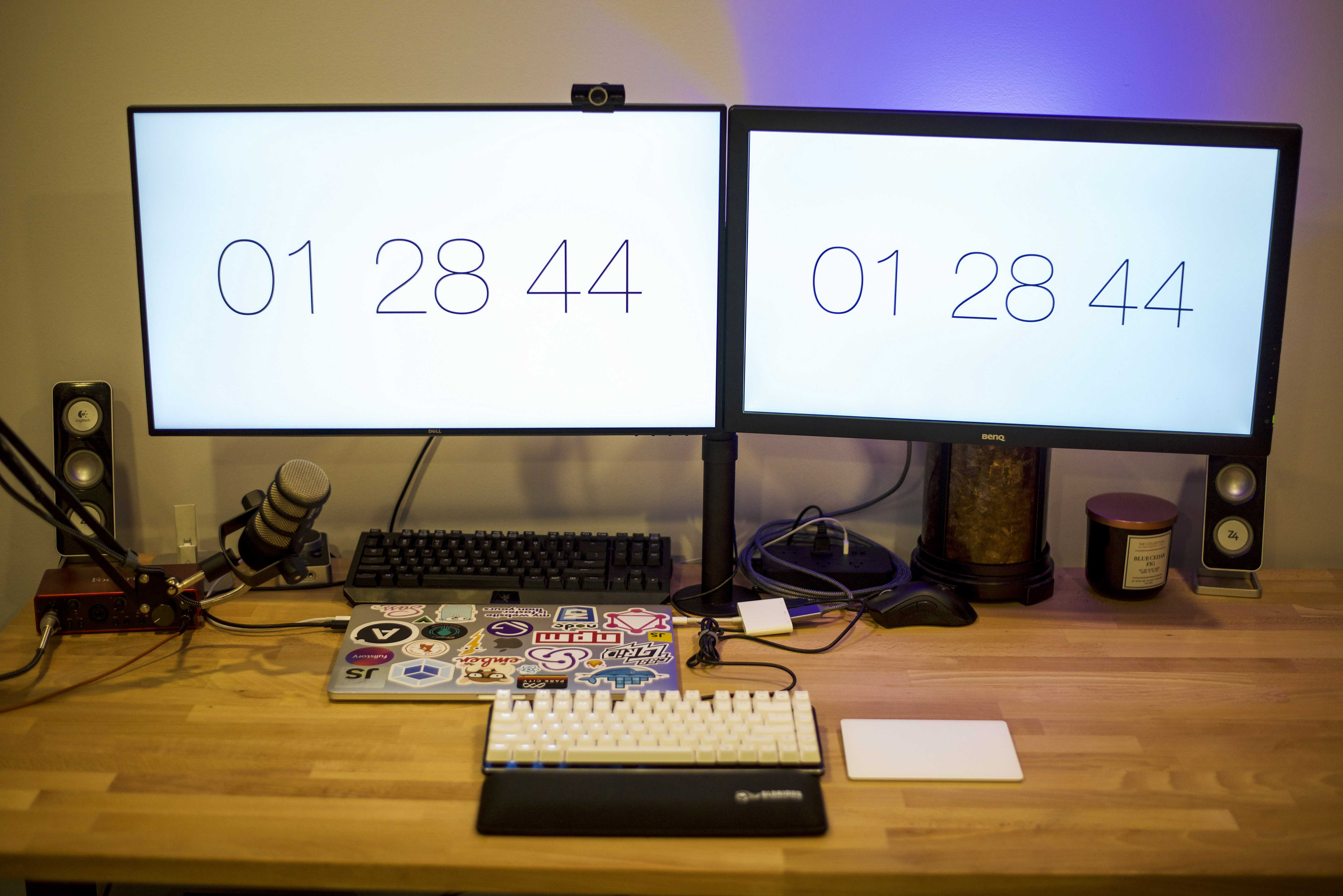 Photo of my desk, 2 monitors and macbook